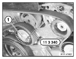 V-ribbed Belt With Tensioner / Deflect Element